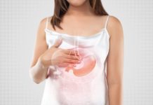 El cannabis puede ser útil para retrasar el vaciado gástrico A woman suffering from gastroesophageal reflux disease