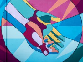Colorful Hands 3 of 3 / George Fox students Annabelle Wombacher, Jared Mar, Sierra Ratcliff and Benjamin Cahoon collaborated on the mural. / Article: https://www.orartswatch.org/painting-the-town-in-newberg/