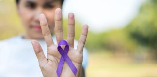 Pancreatic Cancer, Alzheimer, violence day, Woman holding purple Ribbon