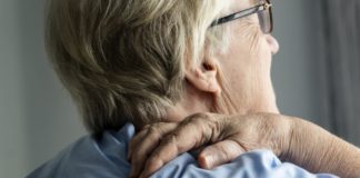 Elderly woman with back pain