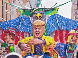 Allegorical car with Donald Trump doll during performing Grand show Mardi Gras parade