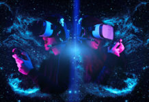 Gamers with virtual reality headsets and gamepads. Elements of this image furnished by NASA.