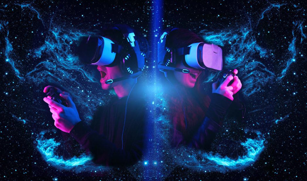 Gamers with virtual reality headsets and gamepads. Elements of this image furnished by NASA.