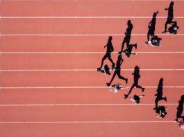 Working on a project for my school’s track team on a summer morning. I noticed the sun was perfectly angled to expand the shadows of the runners into full size. I launched my Mavic Pro to 300 ft. and made them run in arrow shape.Which I was able to capture this interesting overhead shot of them running and their shadows be an identical profile shot of them.