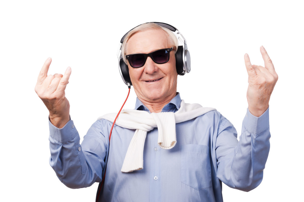 Cheerful senior man in headphones