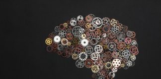 Brain image made out of little cogwheels.