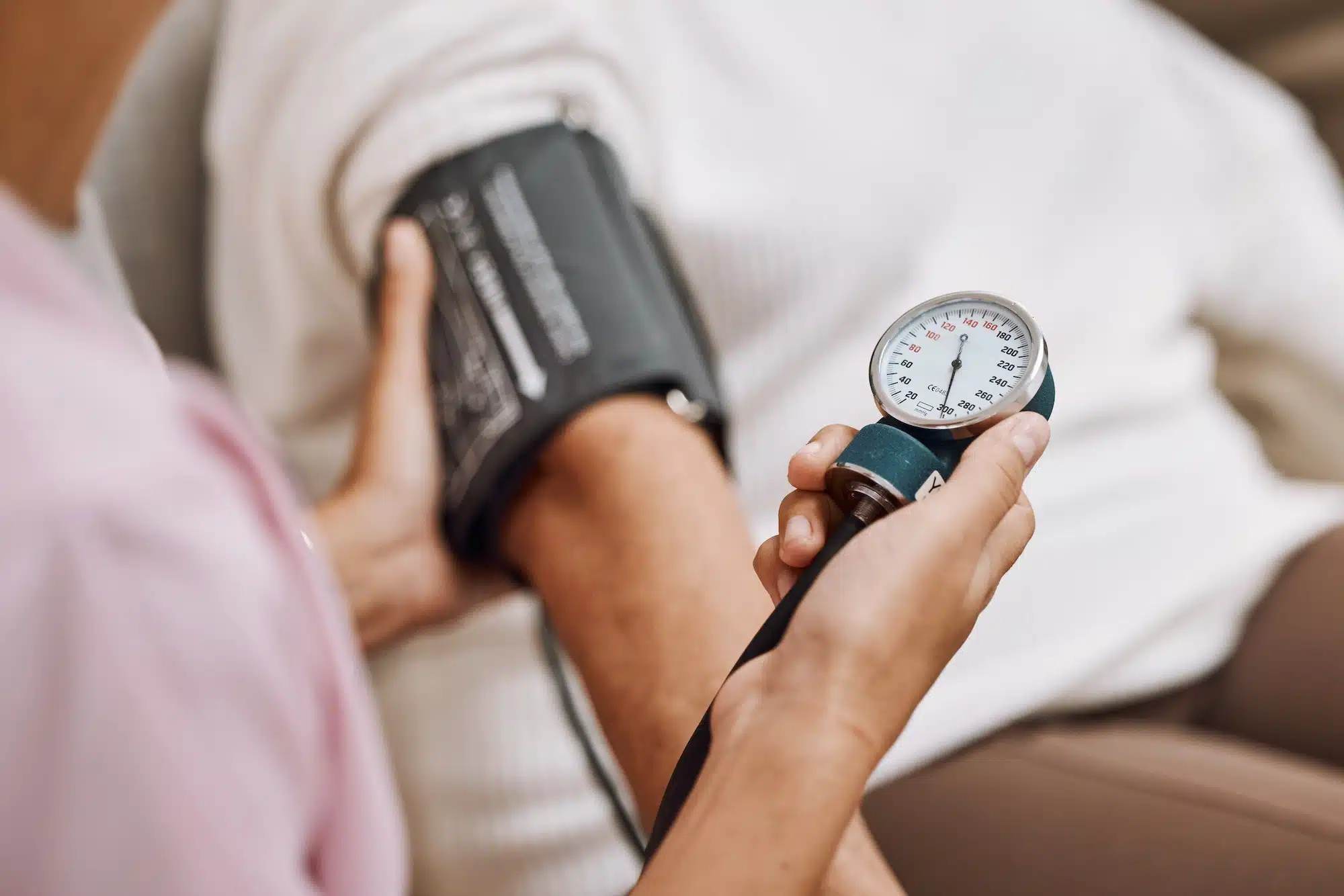 Blood pressure, hypertension and nurse with patient to check diabetes, healthcare consulting and se