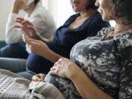 Pregnant support group meetup in a house