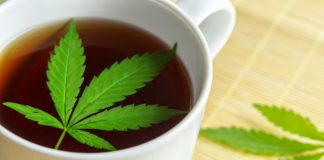 Cannabis herbal tea and marijuana leaves