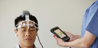 Man during examination with use of brainscope