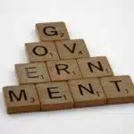 scrabble, scrabble pieces, lettering, letters, wood, scrabble tiles, white background, words, quote, letters, type, typography, design, layout, focus, bokeh, blur, photography, images, image, government, hierarchy, democracy,