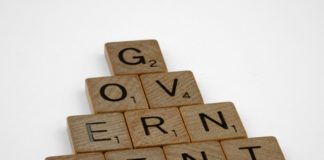scrabble, scrabble pieces, lettering, letters, wood, scrabble tiles, white background, words, quote, letters, type, typography, design, layout, focus, bokeh, blur, photography, images, image, government, hierarchy, democracy,