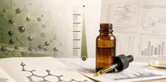 Frasco de CBD junto a una escala de dosis y documentos de investigaci&oacute;n cl&iacute;nica