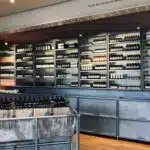 assorted-bottles-displayed-on-gray-stainless-steel-shelf-stockpack-unsplash