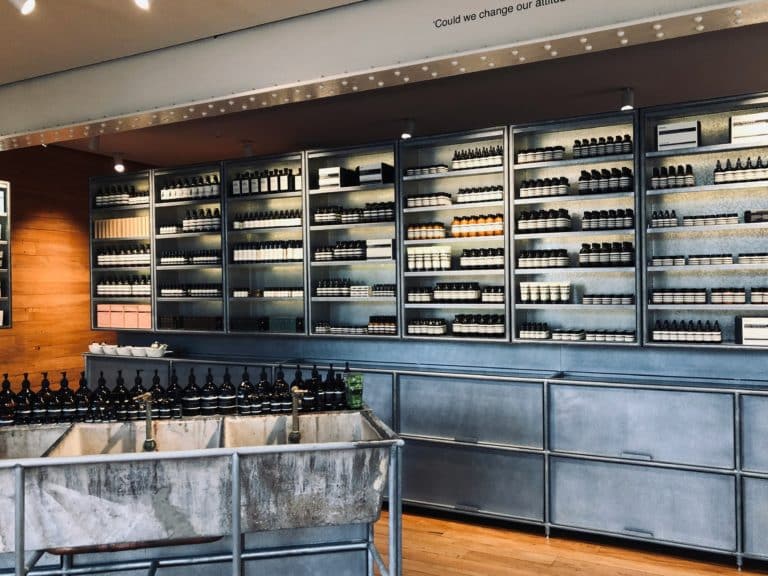assorted-bottles-displayed-on-gray-stainless-steel-shelf-stockpack-unsplash