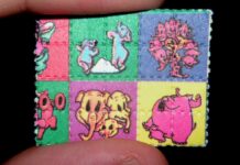 Cómo nació el mito de la droga caníbal Pequeño papel secante con cuadros de colores y personajes de dibujos animados, sostenido entre dos dedos